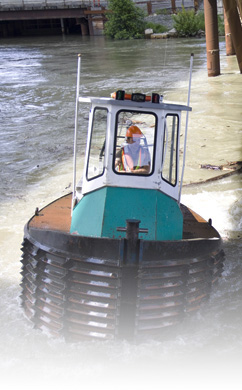 Clearing debris jam under the Port Mann Bridge, Forrest Marine Ltd